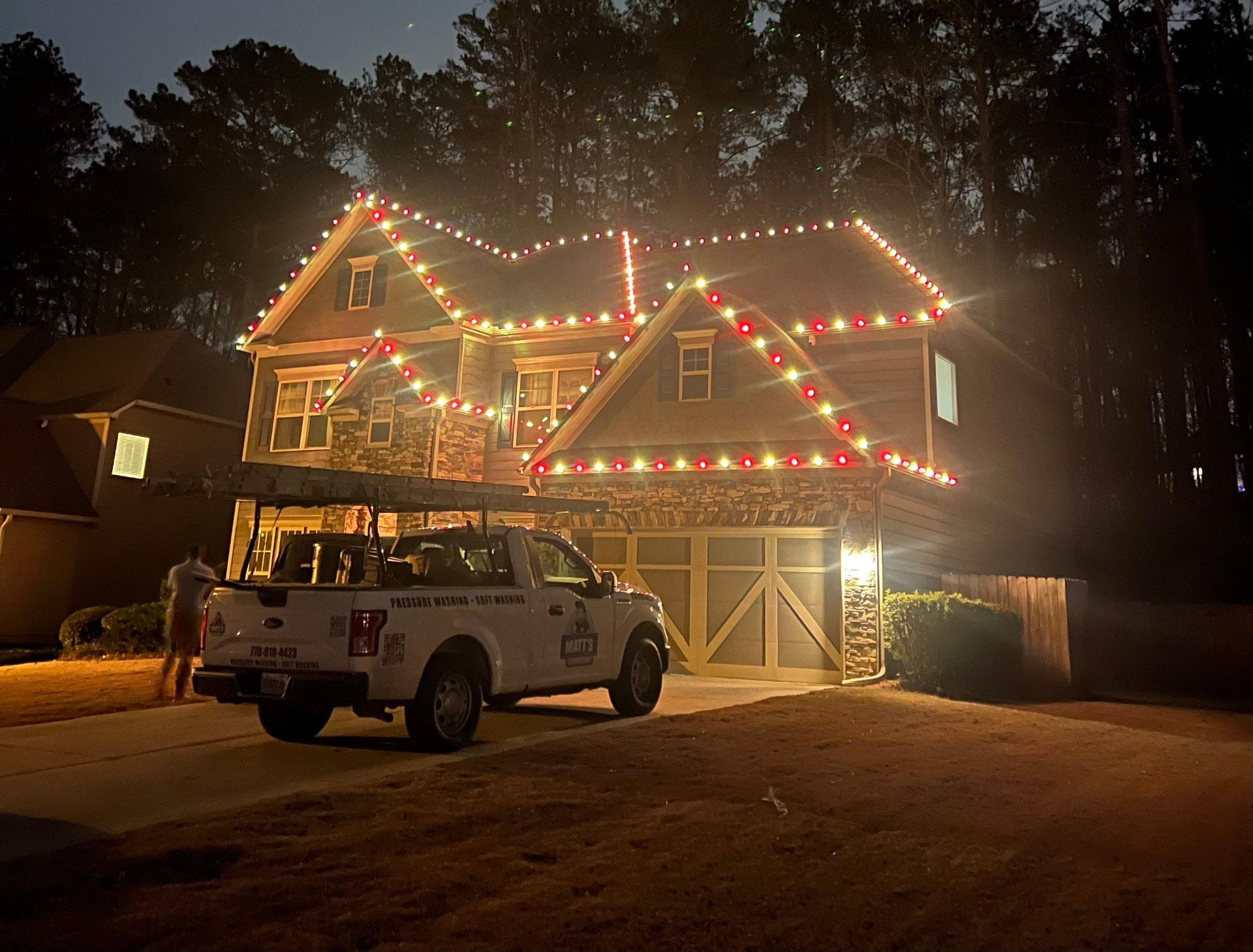 Red and white Christmas light display on a North Georgia home